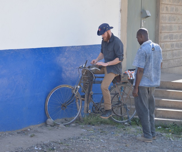 New lessons learnt, Evan learning to sharpen a knife on a bike ;)